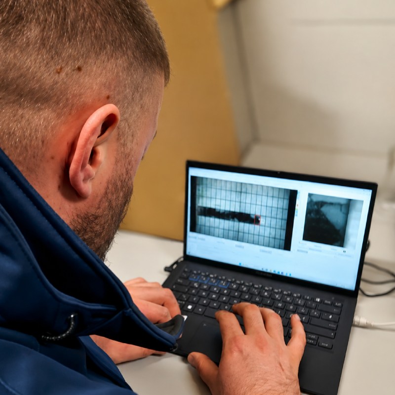 Recma employee on laptop