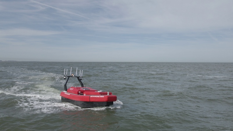 Uncrewed surface vessel (USV) operated by GEOxyz at sea.