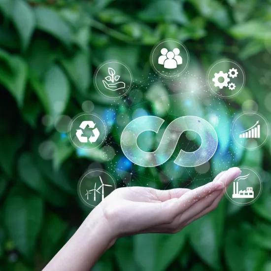 Hand holding circular economy icon circulating endless cycle business world sustainable