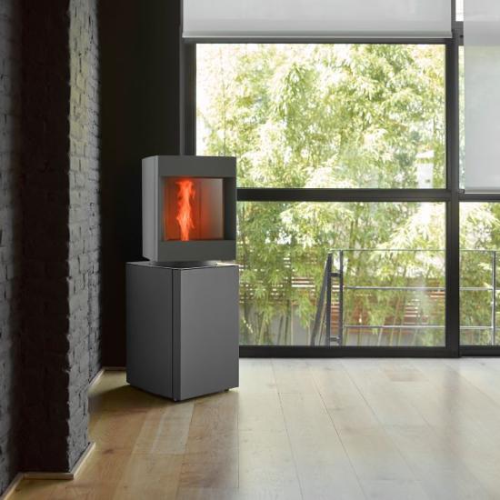 Stuv smart product remotely monitored and controlled pellet stove displayed in a room