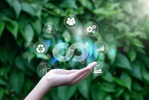 Hand holding circular economy icon circulating endless cycle business world sustainable