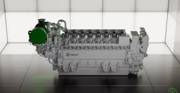 Image of the ABC 8EL23 engine used for the ABC Casting Innovation event. The engine is displayed in a modern, illuminated room, showcasing its intricate design and components.