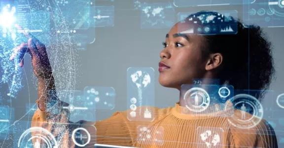 Woman plays with AI on touchscreen 