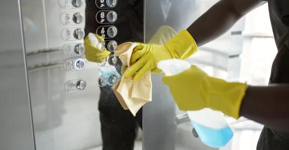 hands-cleaning-elevator-buttons