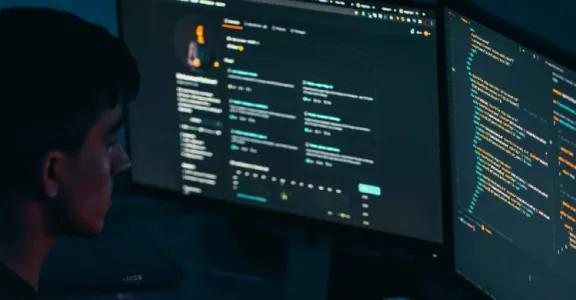 A man coding 