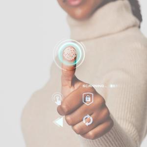 woman scanning fingerprint with futuristic interface smart technology