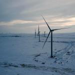 Wind turbines in cold snowy landscape